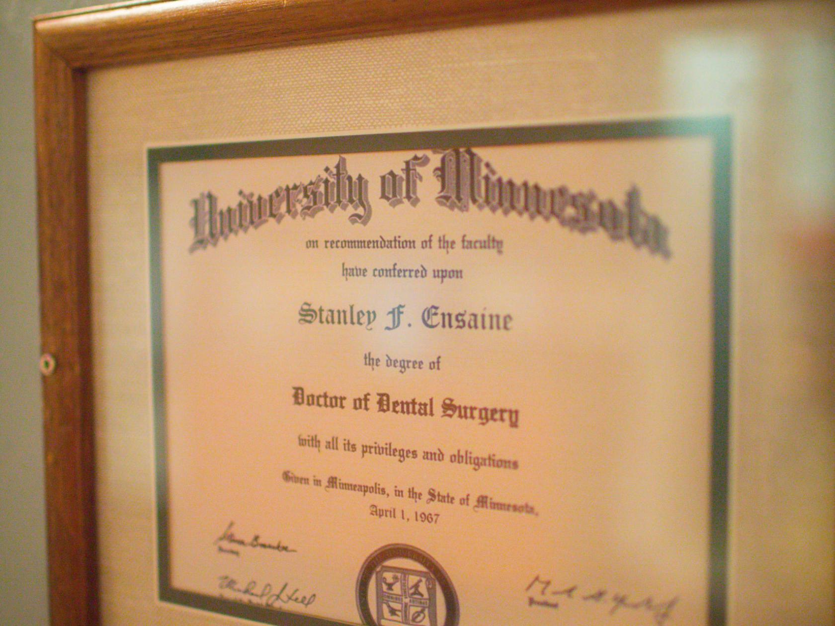 A PHD degree on a wall.