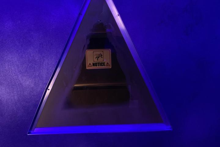 a clock on the front screen of a cell phone