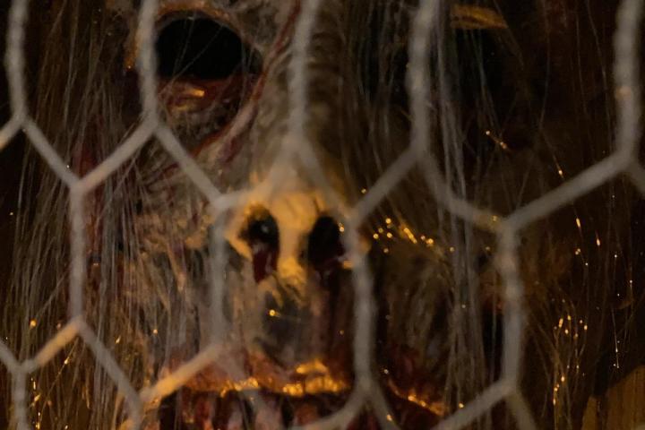 a close up of a wire fence