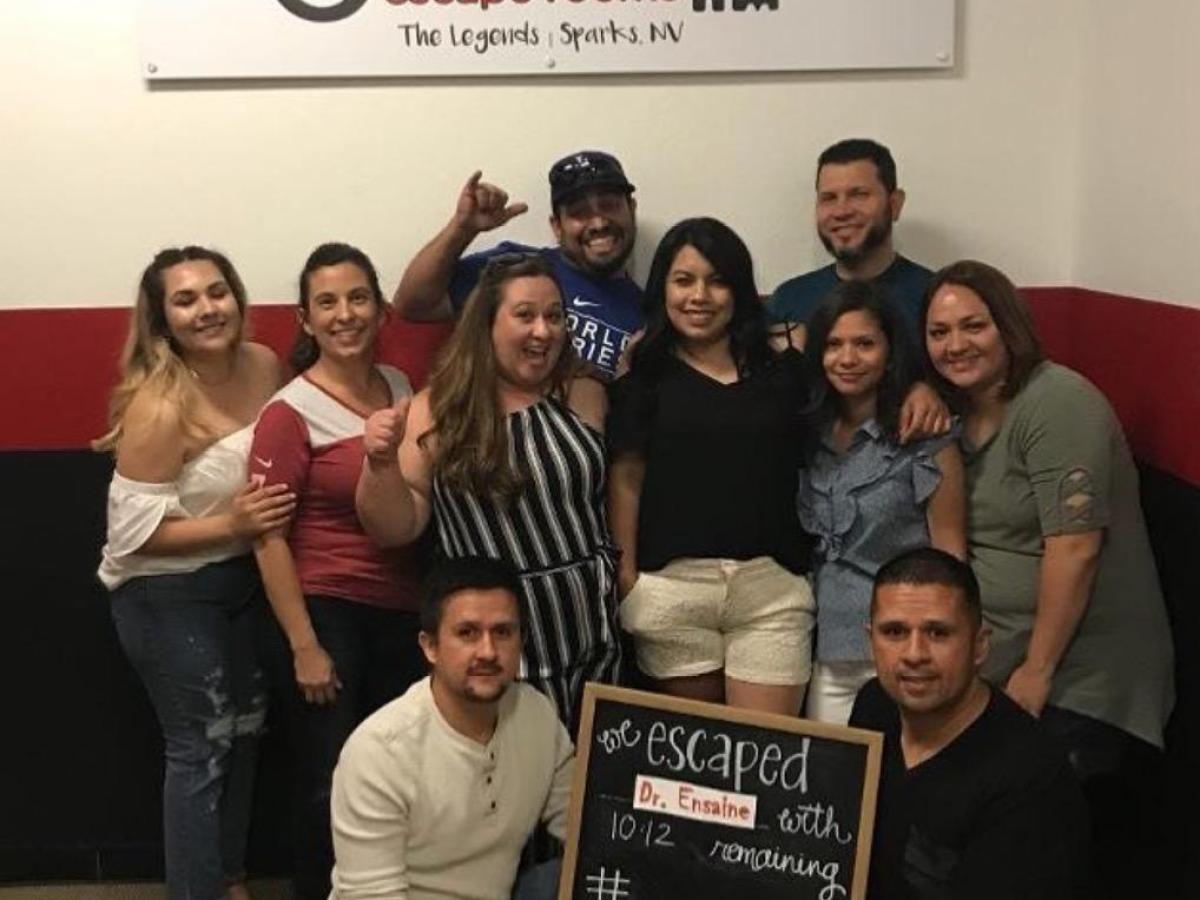 a group of people posing for a photo