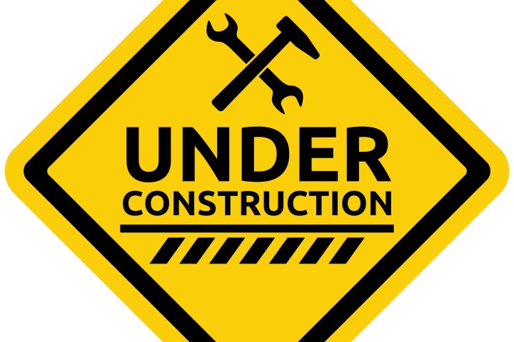 Yellow diamond sign with 'Under Construction' and tools icon.